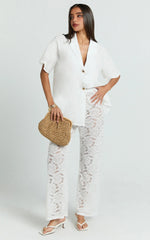 White Two-Piece Set: Relaxed Shirt and Lace Pants