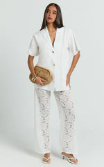 White Two-Piece Set: Relaxed Shirt and Lace Pants